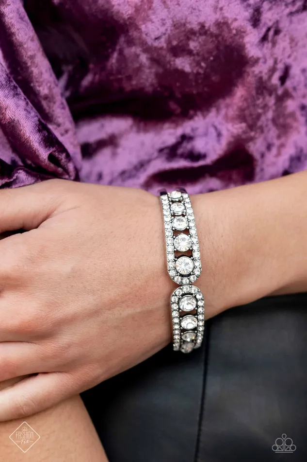 Paparazzi Accessories Bracelets Spellbinding Splendor White Rhinestone Silver Hinged Bracelet Paparazzi Fashion Fix January 2023